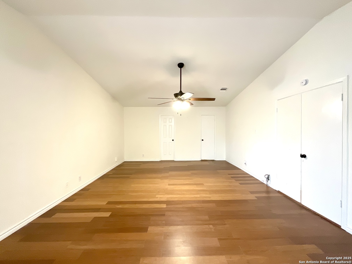 9919 Fortune Ridge Drive Converse, TX 78109 - Photo 24 of 34 a view of empty room with wooden floor
