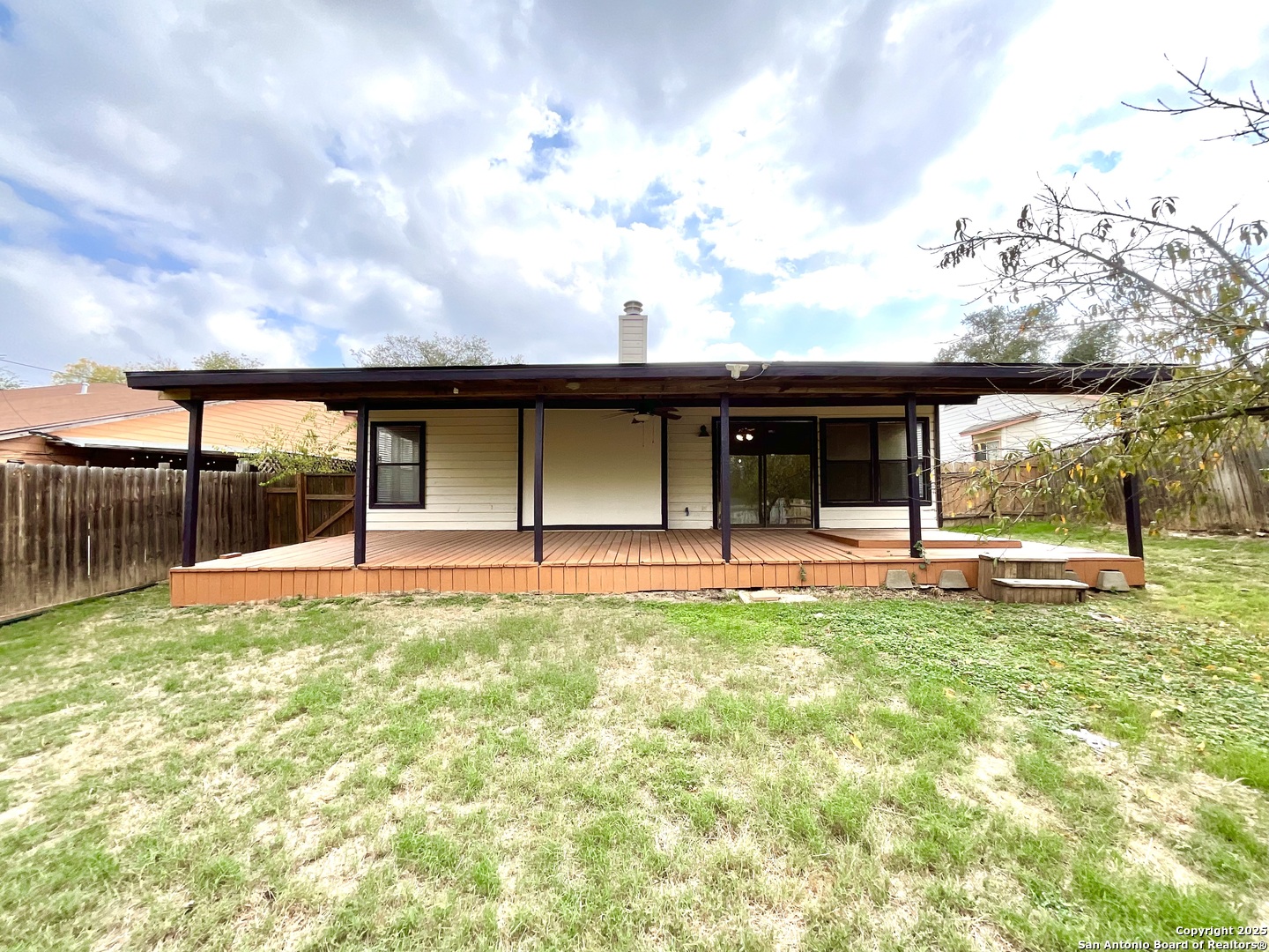 9919 Fortune Ridge Drive Converse, TX 78109 - Photo 30 of 34 a view of a house with backyard porch and sitting area