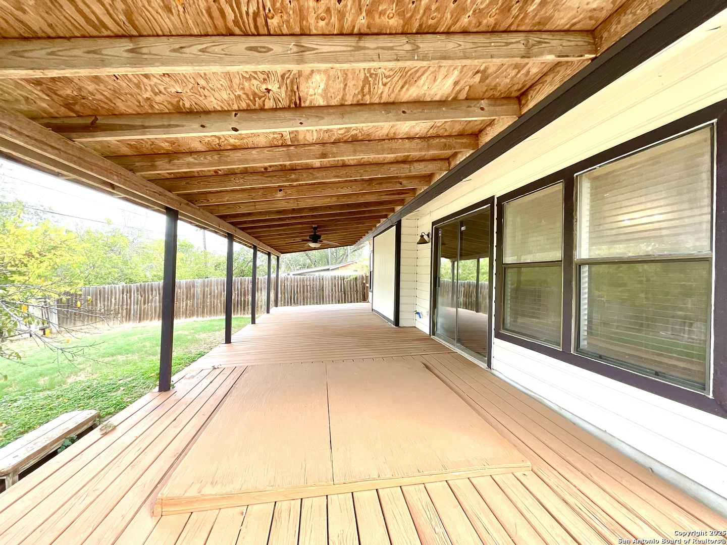 9919 Fortune Ridge Drive Converse, TX 78109 - Photo 31 of 34 a view of empty room with wooden floor and city view