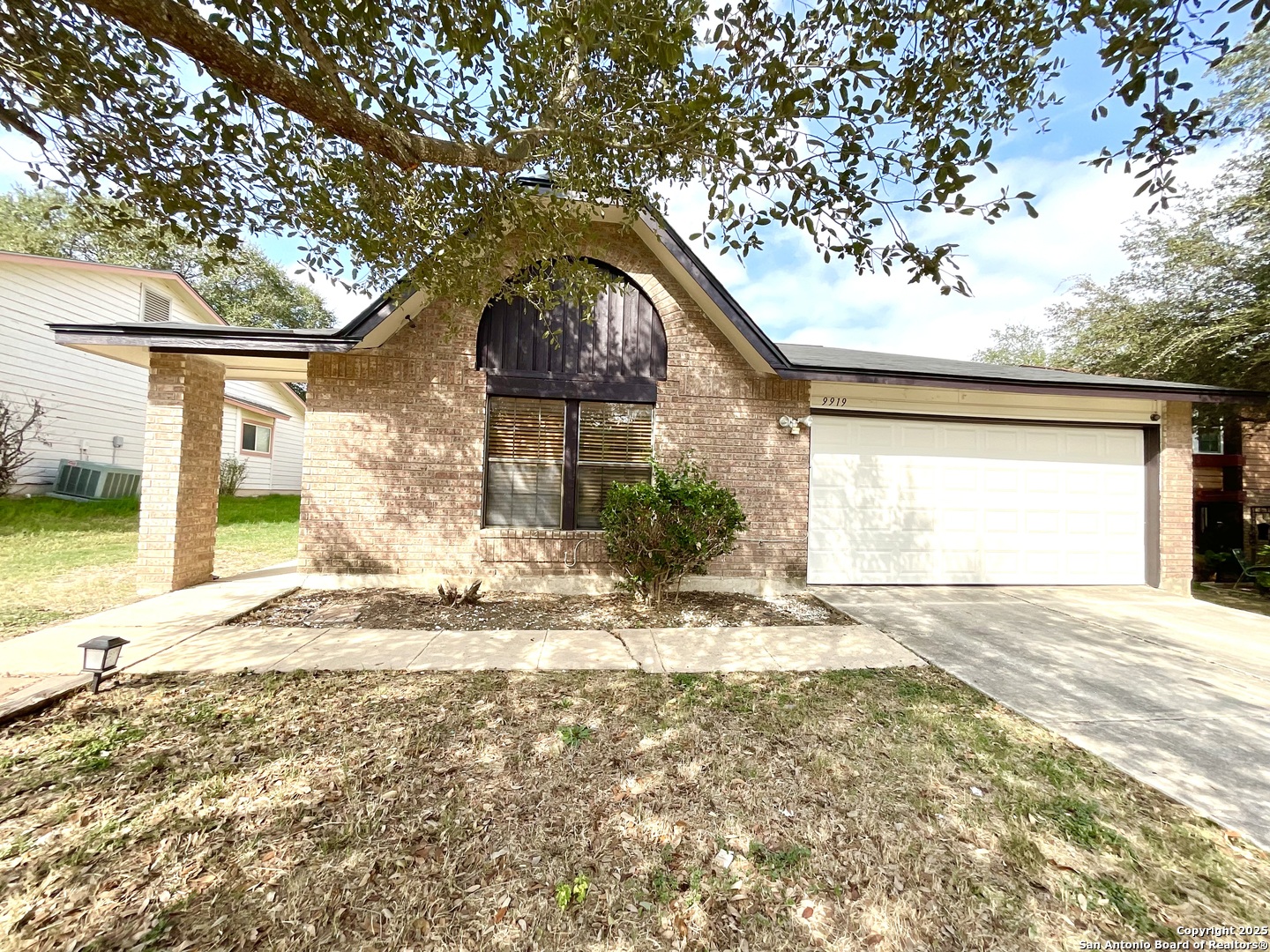 9919 Fortune Ridge Drive Converse, TX 78109 - Photo 4 of 34 a house with trees in the background