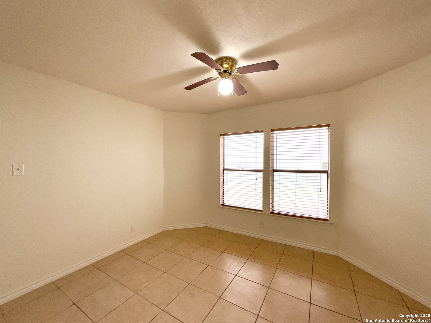 9919 Fortune Ridge Drive Converse, TX 78109 - Photo 10 of 34 a view of an empty room with a window