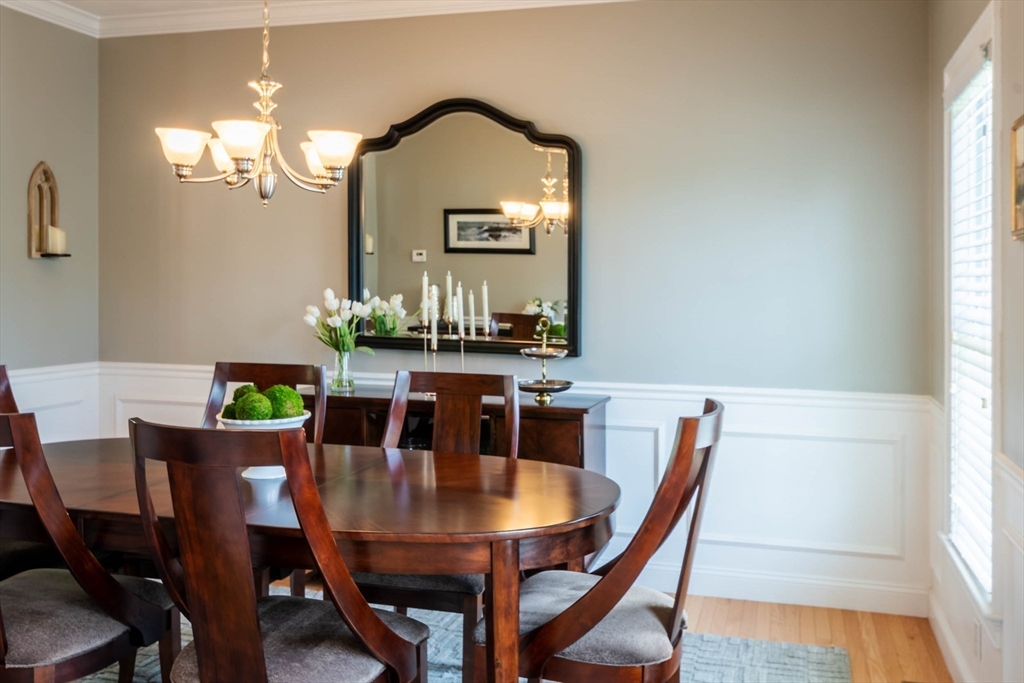493 Taylor Road Stow, MA 01775 - Photo 15 of 40 a view of a dining room with furniture and window