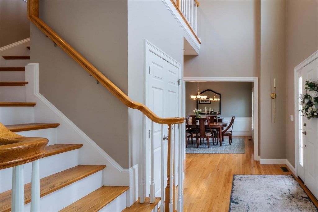 493 Taylor Road Stow, MA 01775 - Photo 16 of 40 a view of entryway and hall with dining room