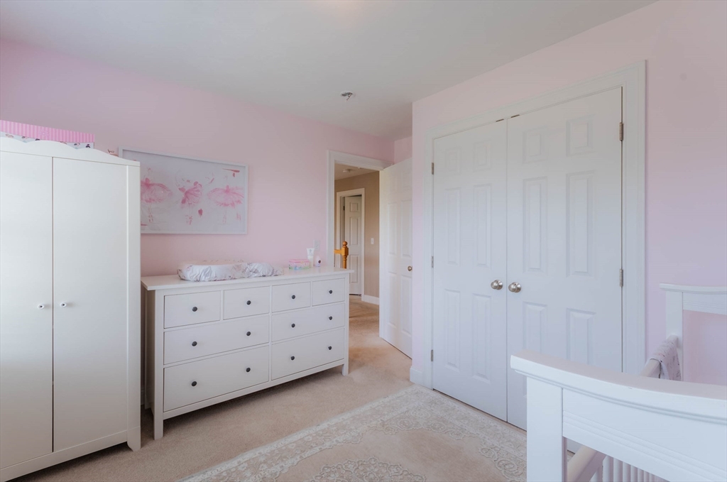 493 Taylor Road Stow, MA 01775 - Photo 27 of 40 a room with cabinets