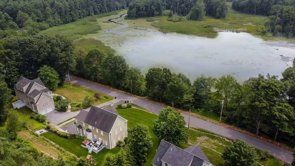 493 Taylor Road Stow, MA 01775 - Photo 40 of 40 an aerial view of residential house with outdoor space