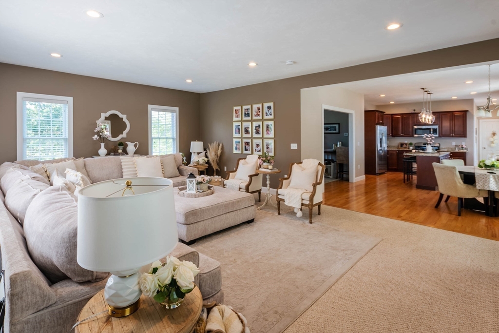 493 Taylor Road Stow, MA 01775 - Photo 8 of 40 a living room with furniture and a large window