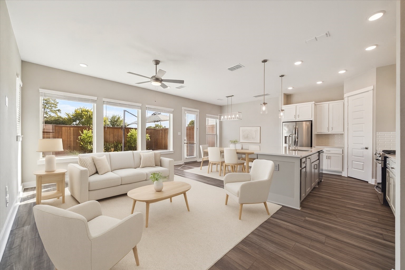 a very nice looking living room with a large window