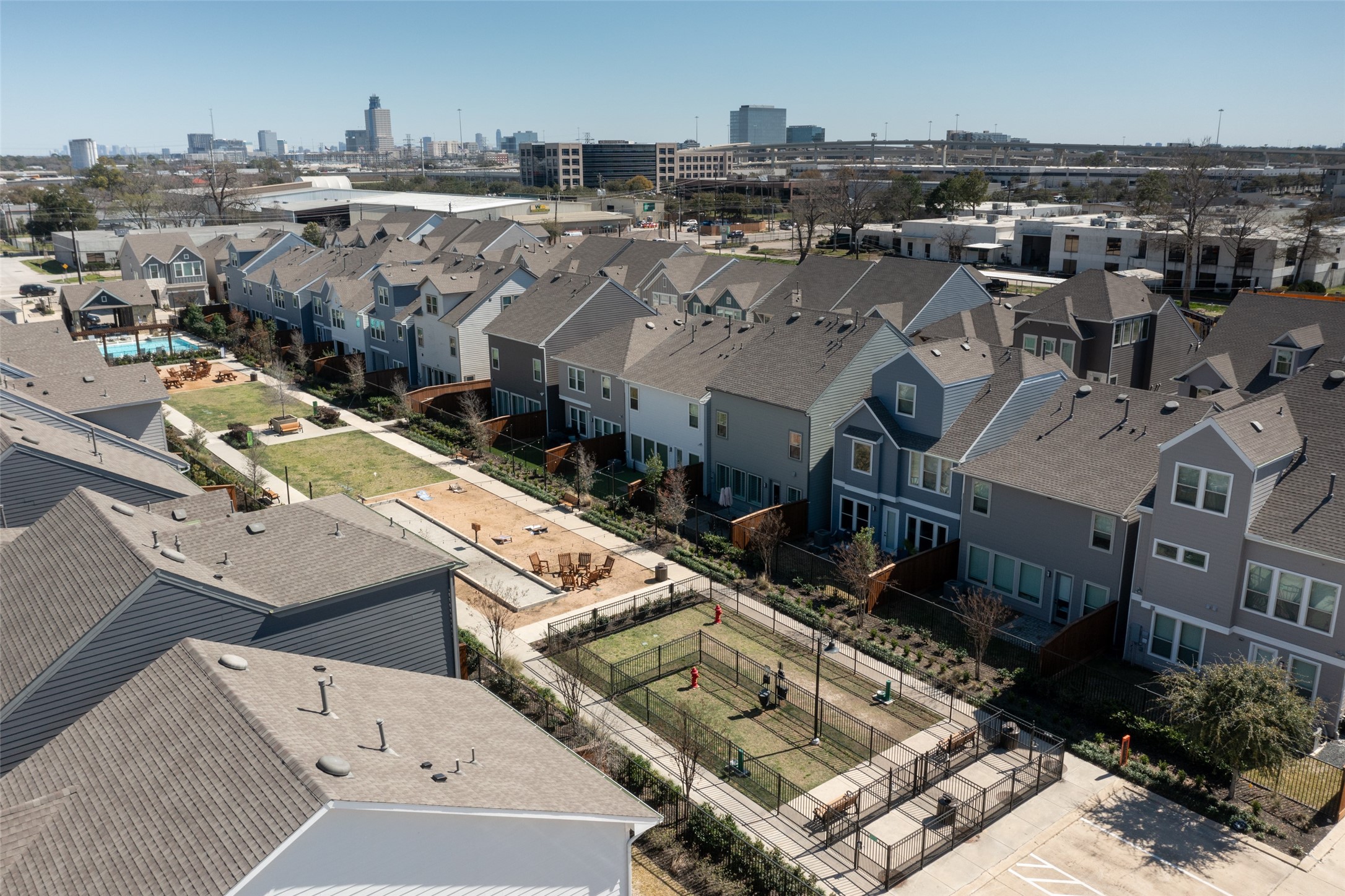 10961 Hewitt Cliff Lane Houston, TX 77043 - Photo 6 of 26 an aerial view of a house with a yard garage and mountain view
