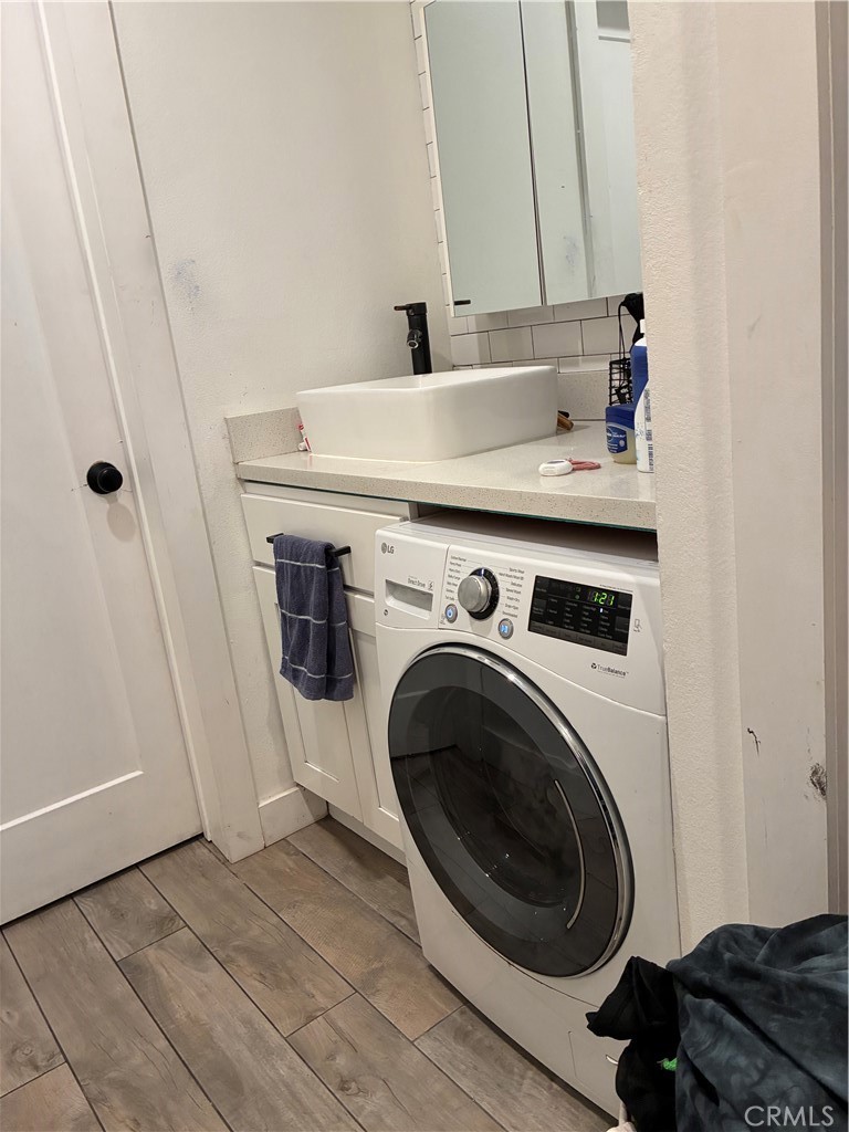8990 19th Street, Unit 329 Rancho Cucamonga, CA 91701 - Photo 7 of 13 a utility room with dryer and washer