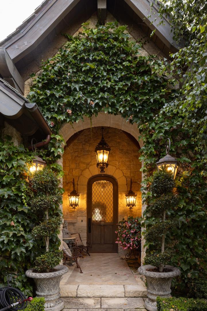 2 La Pradera Carmel, CA 93923 - Photo 11 of 42 a front view of a house with lots of plants