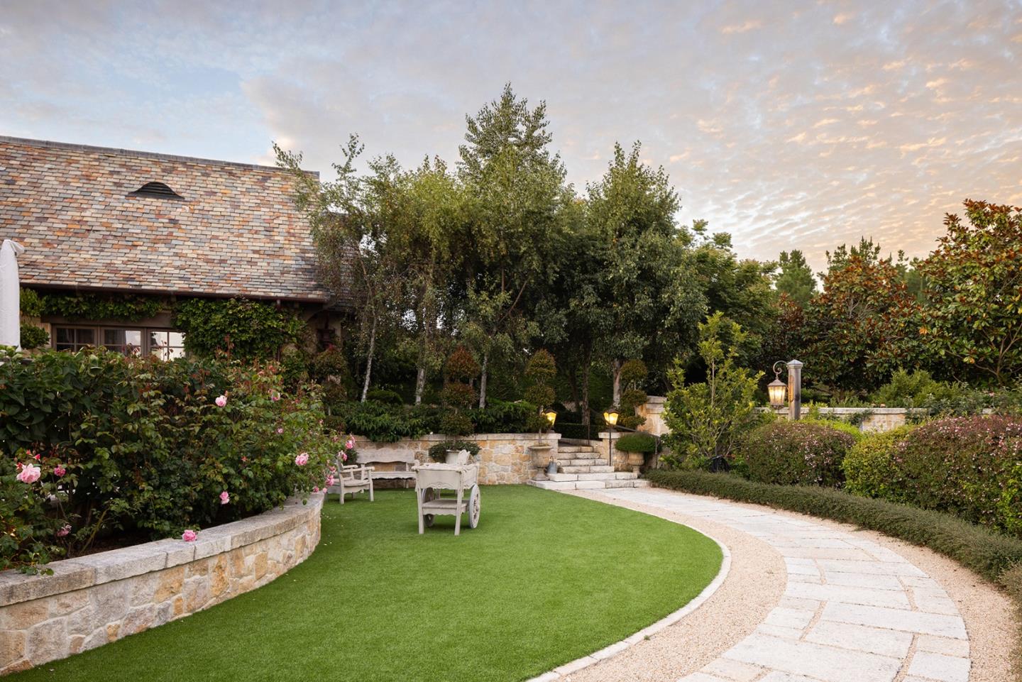 2 La Pradera Carmel, CA 93923 - Photo 31 of 42 a view of a bench in the garden near a lake
