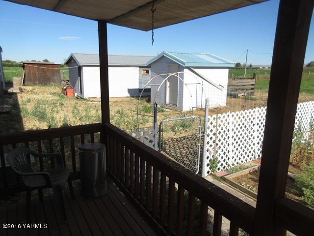 270 Evans Road Wapato, WA 98951 - Photo 34 of 42 a view of a glass door with a balcony