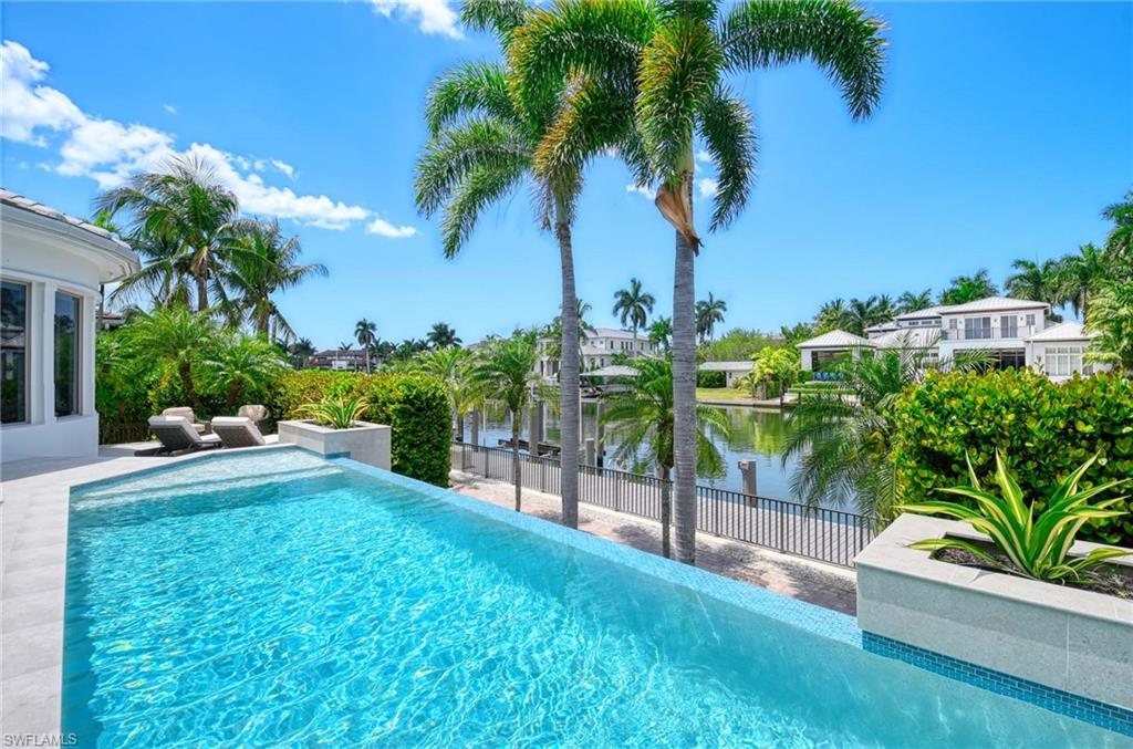 1888 6th Street South Naples, FL 34102 - Photo 12 of 37 a view of a backyard