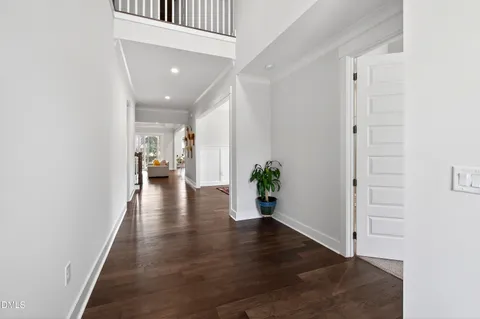 a kitchen with stainless steel appliances granite countertop a sink a stove a oven a counter space and cabinets