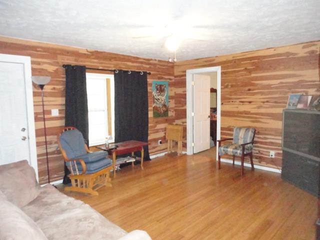 962 Espy Road Manchester, TN 37355 - Photo 19 of 19 Living room with cedar walls, measuring 16x13