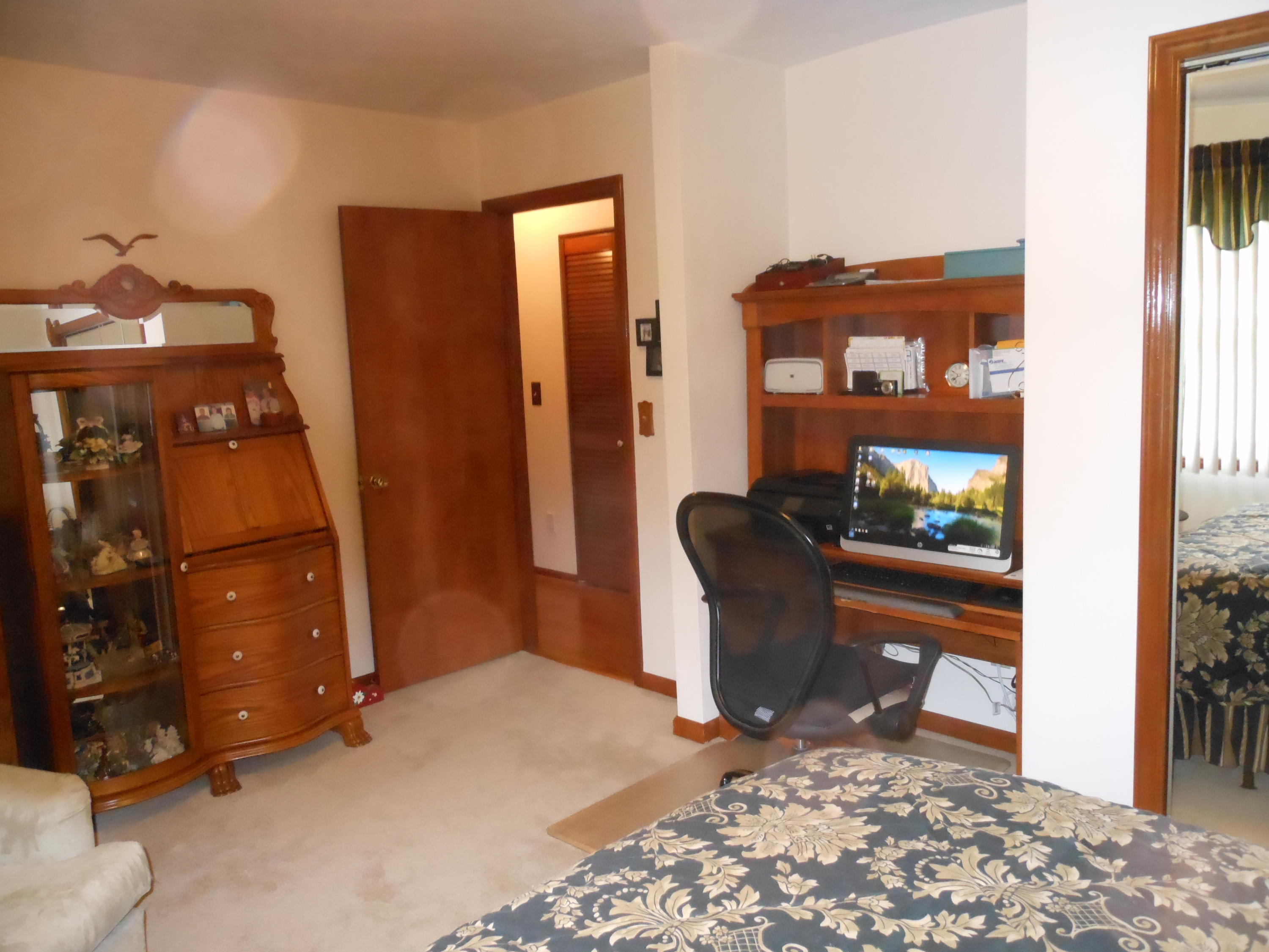 2767 Rutrough Road Southeast Roanoke, VA 24014 - Photo 16 of 36 a living room with furniture and a lamp