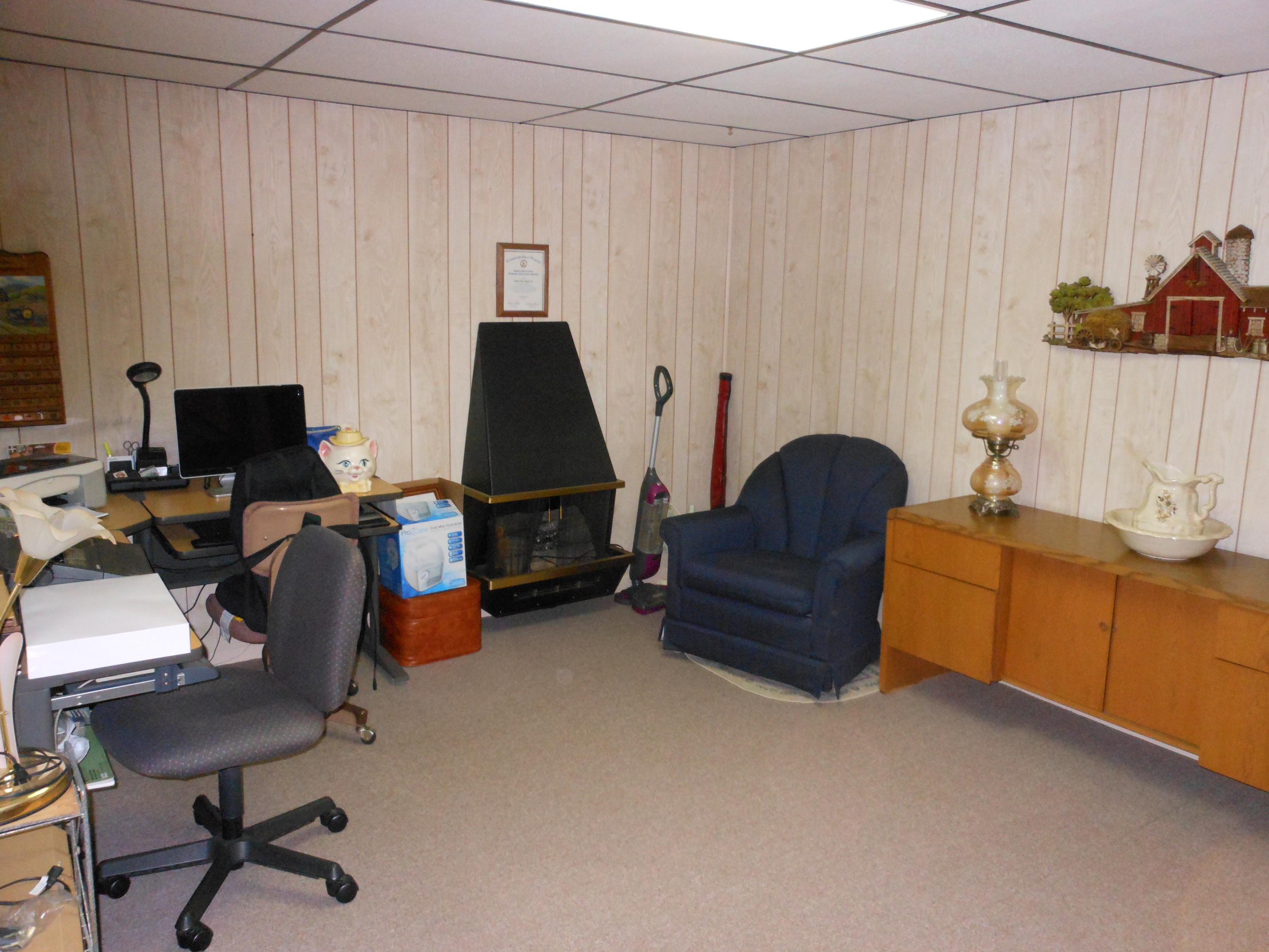 2767 Rutrough Road Southeast Roanoke, VA 24014 - Photo 23 of 36 a living room with furniture and a window