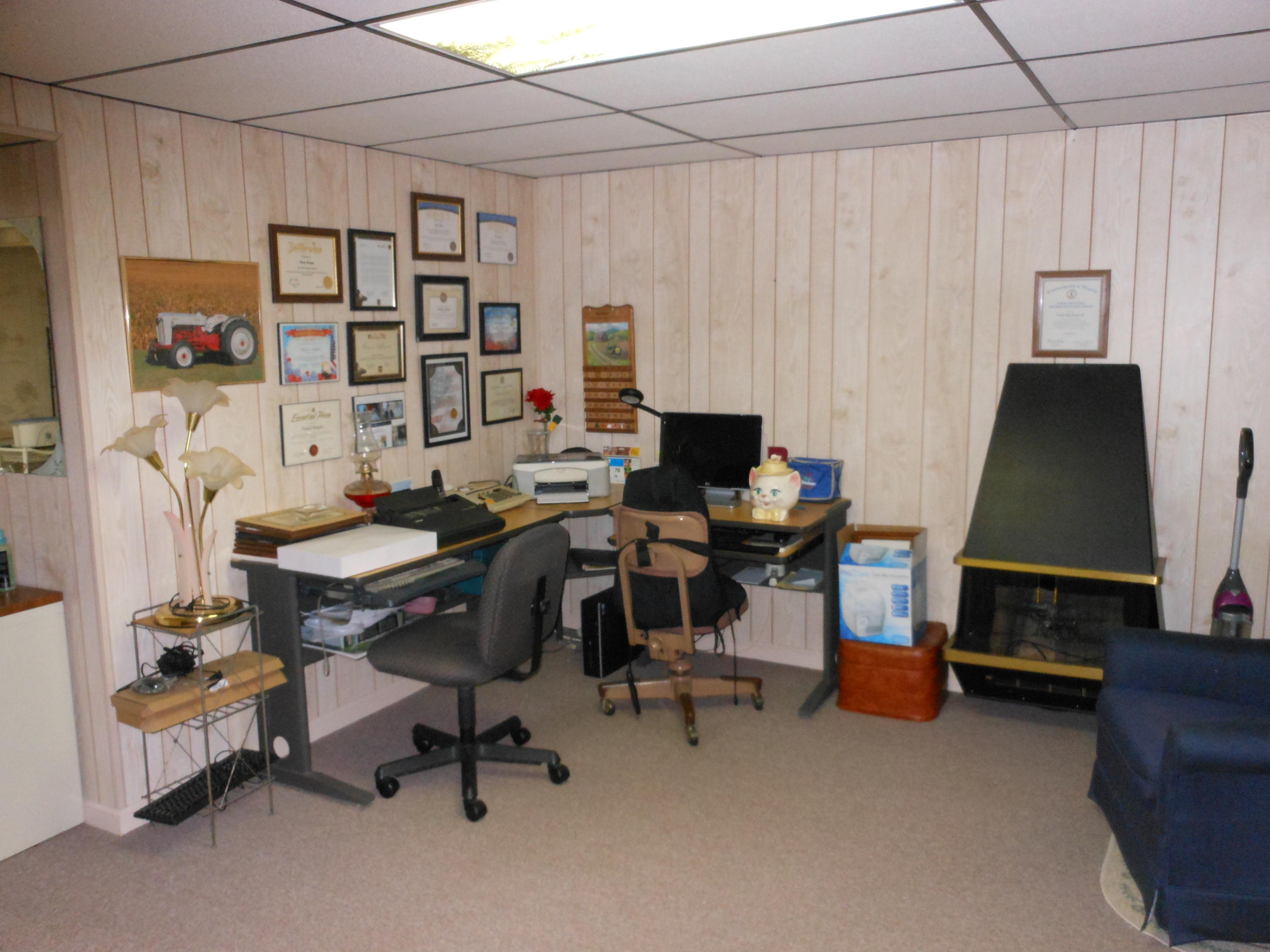 2767 Rutrough Road Southeast Roanoke, VA 24014 - Photo 24 of 36 a view of a workspace with furniture and a window
