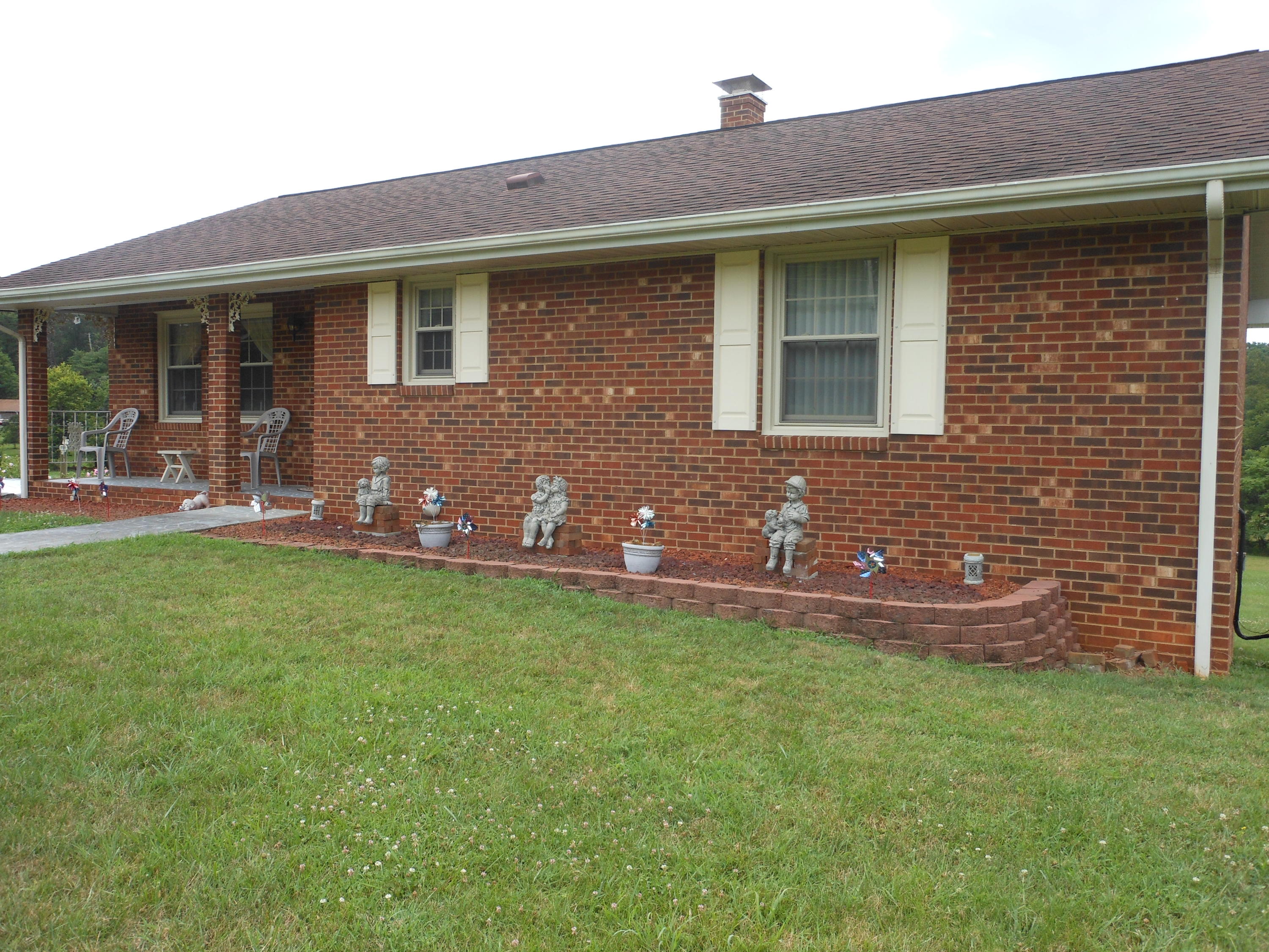 2767 Rutrough Road Southeast Roanoke, VA 24014 - Photo 35 of 36 a front view of house with yard