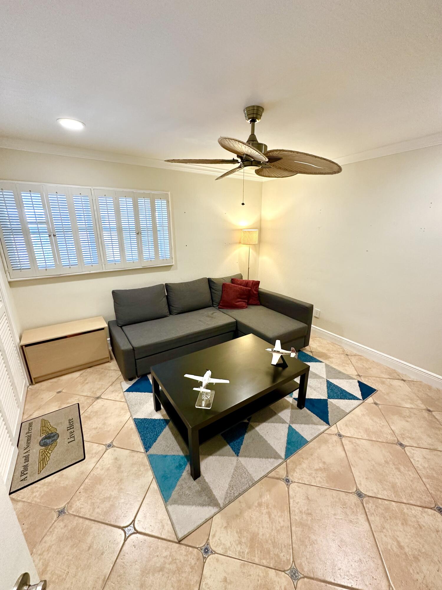 2501 South Ocean Boulevard, Unit 3040 Boca Raton, FL 33432 - Photo 11 of 22 a living room with furniture