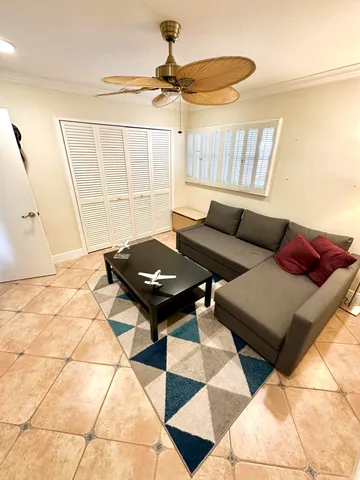 a living room with a couch and a table