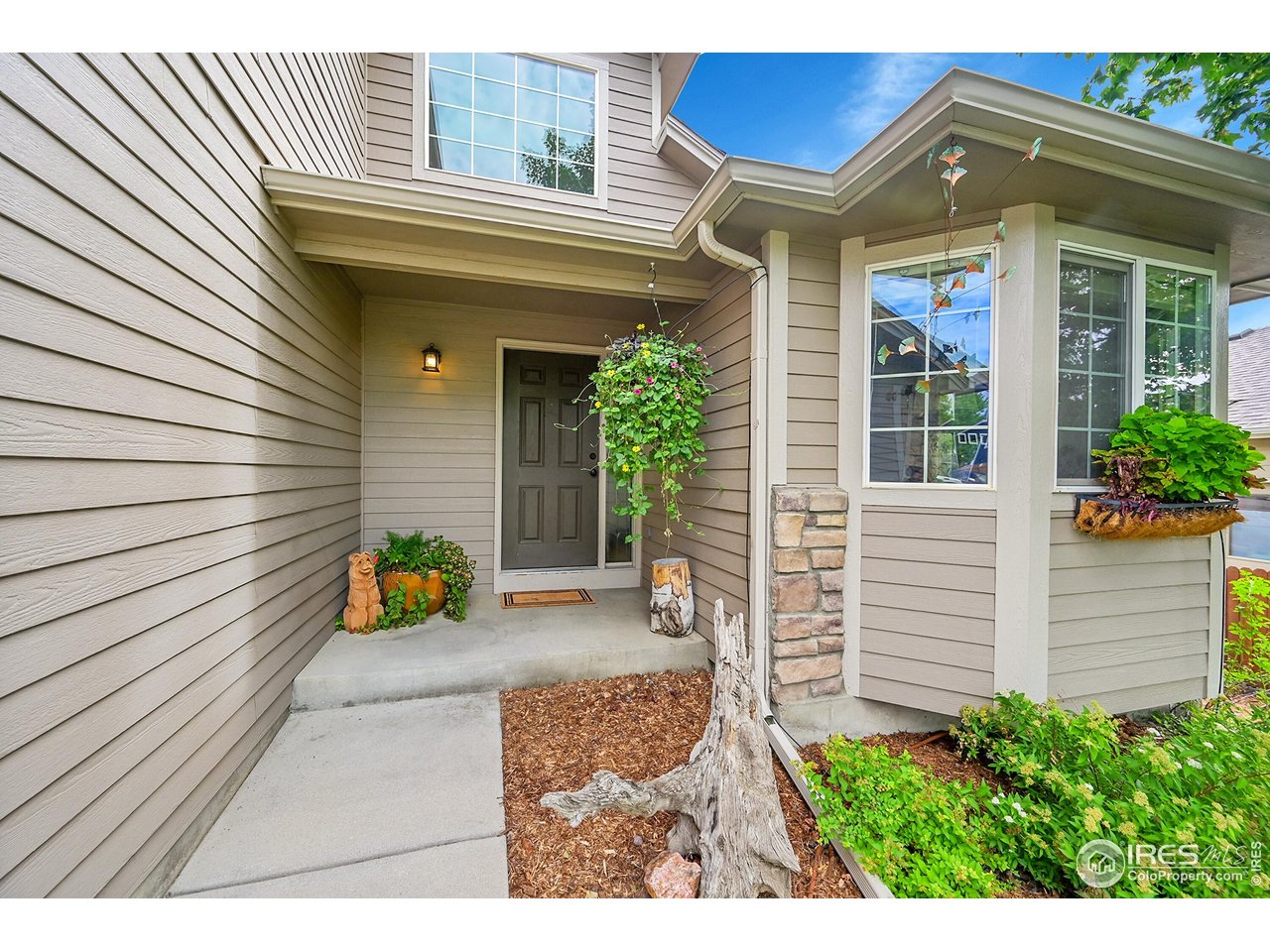 514 Peyton Drive Fort Collins, CO 80525 - Photo 2 of 40 a view of a entryway door front of house