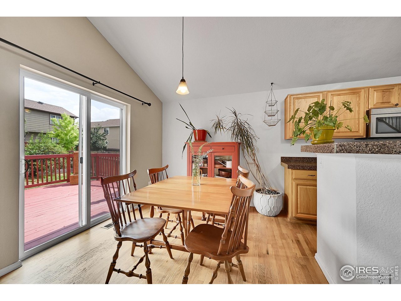 514 Peyton Drive Fort Collins, CO 80525 - Photo 9 of 40 a dining room with furniture and window