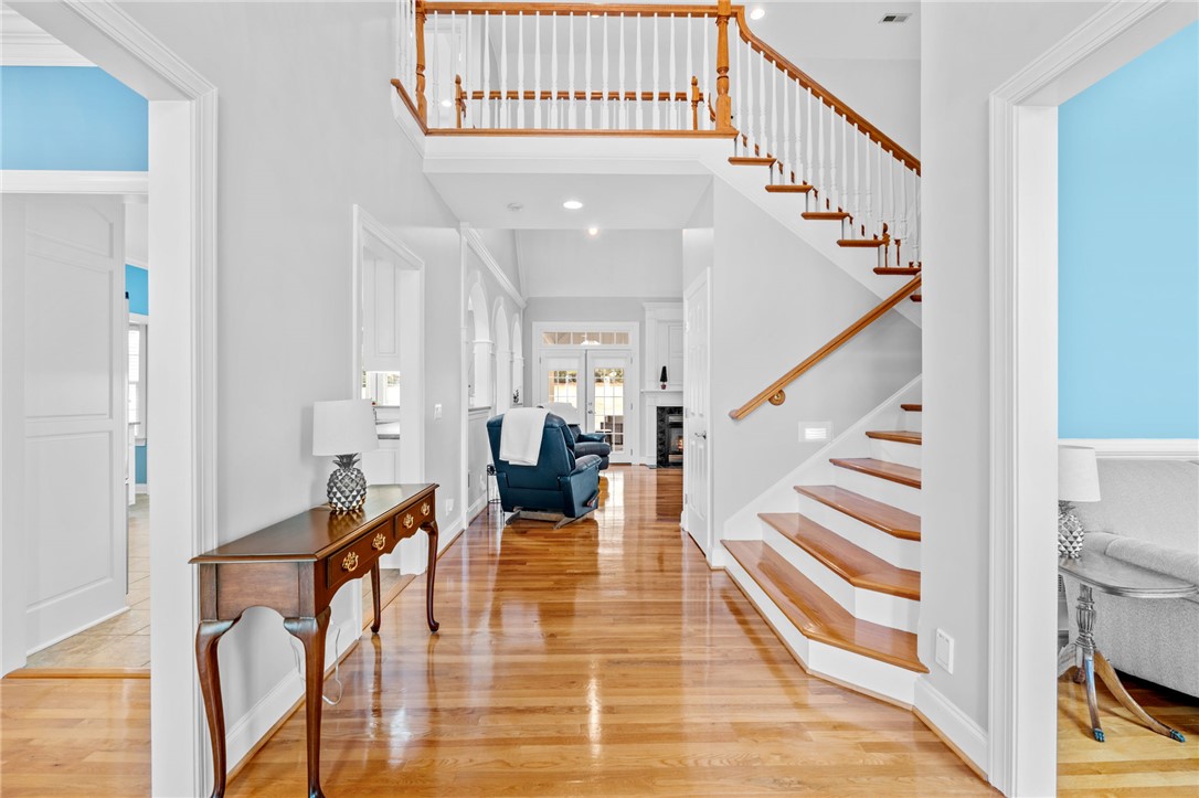 100 Farm Terrace Court Easley, SC 29642 - Photo 13 of 47 This bright entry opens to a spacious living area with hardwood floors and a grand staircase.