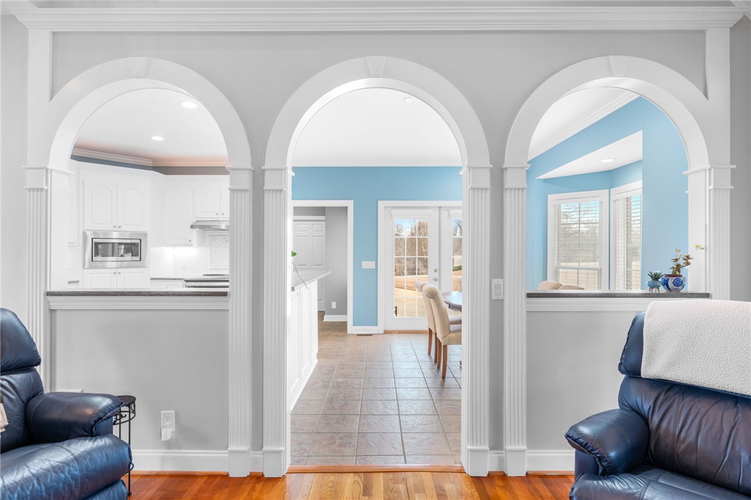 100 Farm Terrace Court Easley, SC 29642 - Photo 16 of 47 This inviting interior features elegant archways and a seamlessly flowing open-plan design.