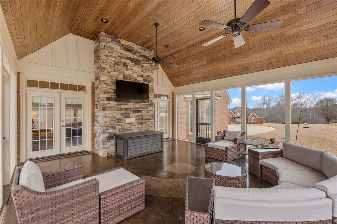 100 Farm Terrace Court Easley, SC 29642 - Photo 5 of 47 This inviting porch offers vaulted wood ceilings and ample space for gatherings.