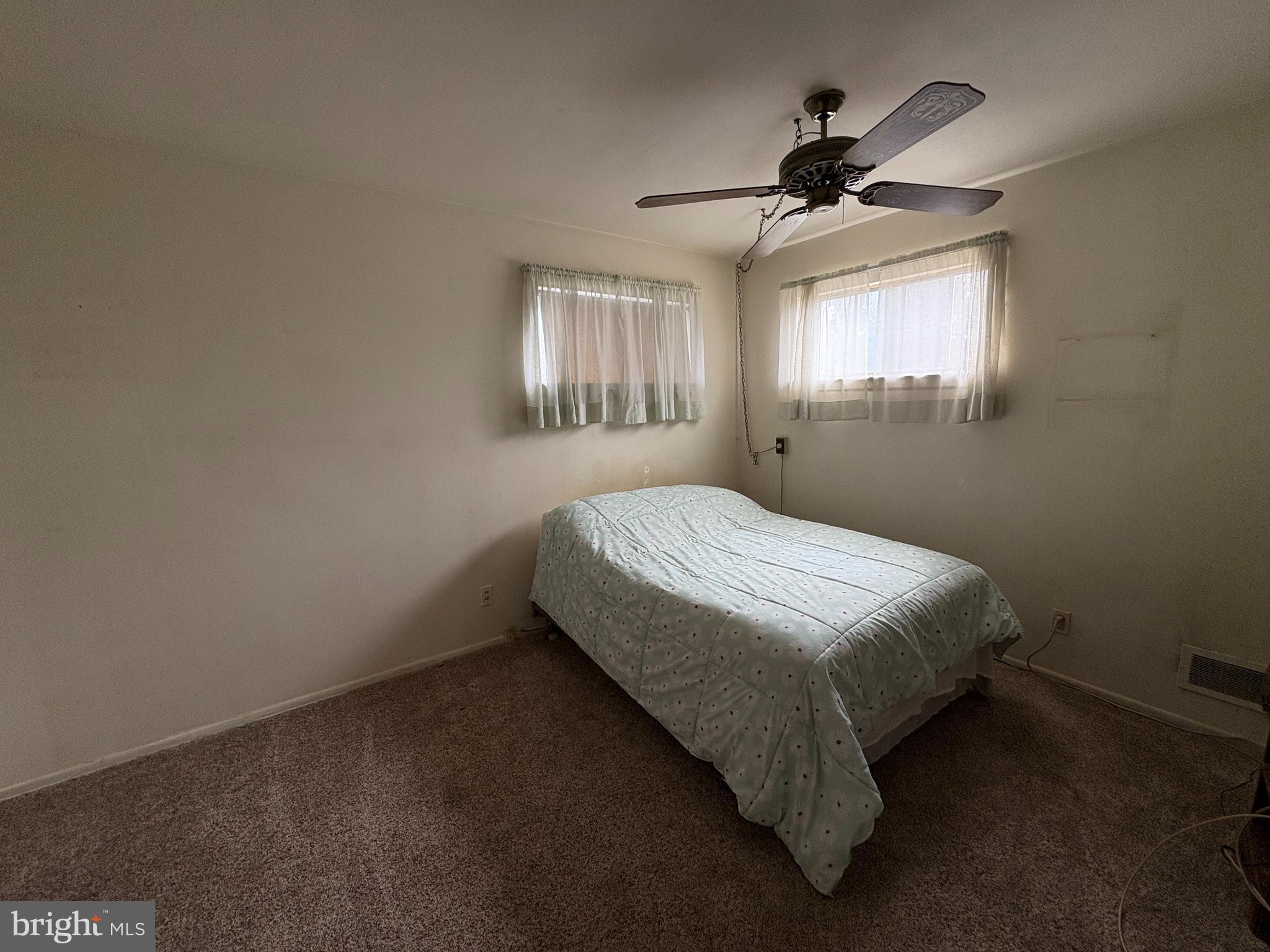 63 Gerard Road Hamilton, NJ 08620 - Photo 14 of 19 a bedroom with a bed and a window