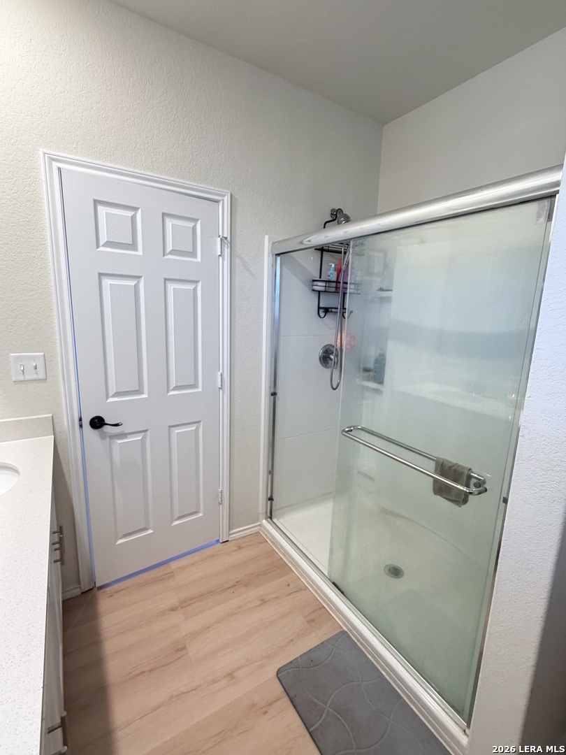 10255 Crossbuck Converse, TX 78109 - Photo 12 of 19 a bathroom with a shower