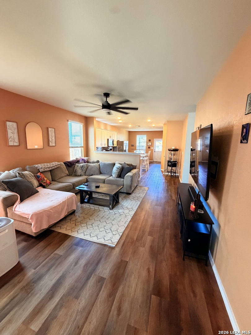 10255 Crossbuck Converse, TX 78109 - Photo 6 of 19 a living room with furniture and wooden floor