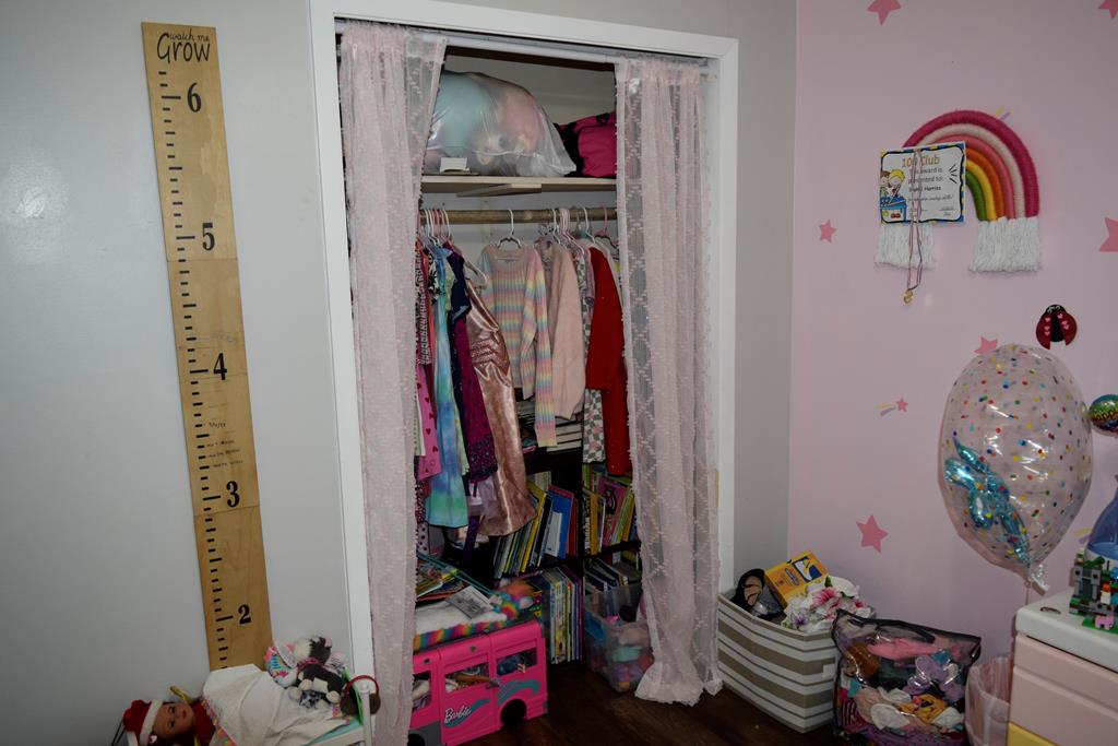 420 Bluebonnet Drive Kerrville, TX 78028 - Photo 17 of 22 a view of a bedroom with baby toys