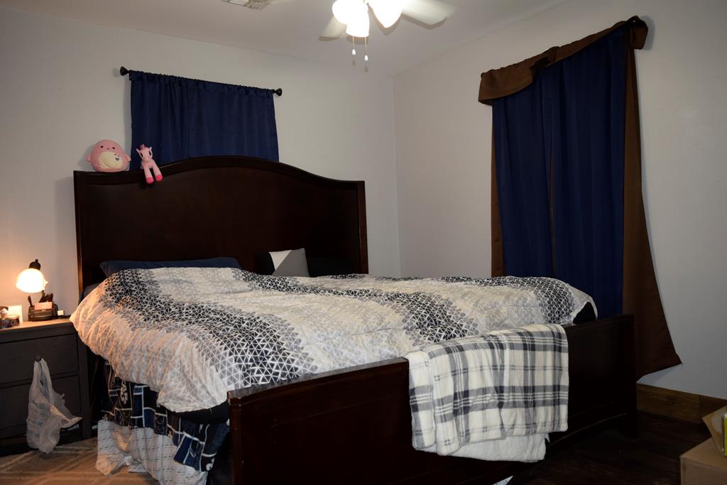 420 Bluebonnet Drive Kerrville, TX 78028 - Photo 18 of 22 a bedroom with a bed and a dresser