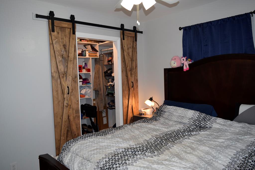 420 Bluebonnet Drive Kerrville, TX 78028 - Photo 19 of 22 a bedroom with a bed and a closet