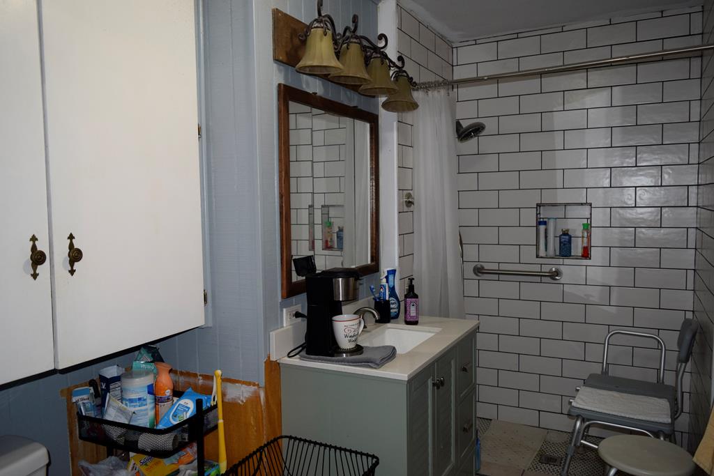 420 Bluebonnet Drive Kerrville, TX 78028 - Photo 22 of 22 a bathroom with a sink and a mirror