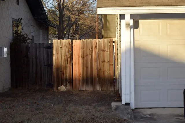 a view of a back yard of the house