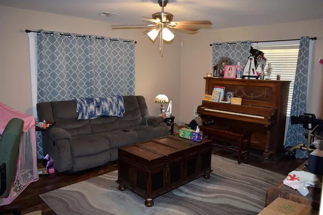 a kitchen with a sink stove and microwave