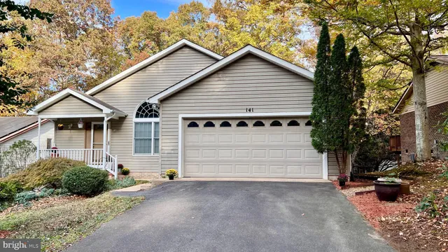 front view of a house with a street
