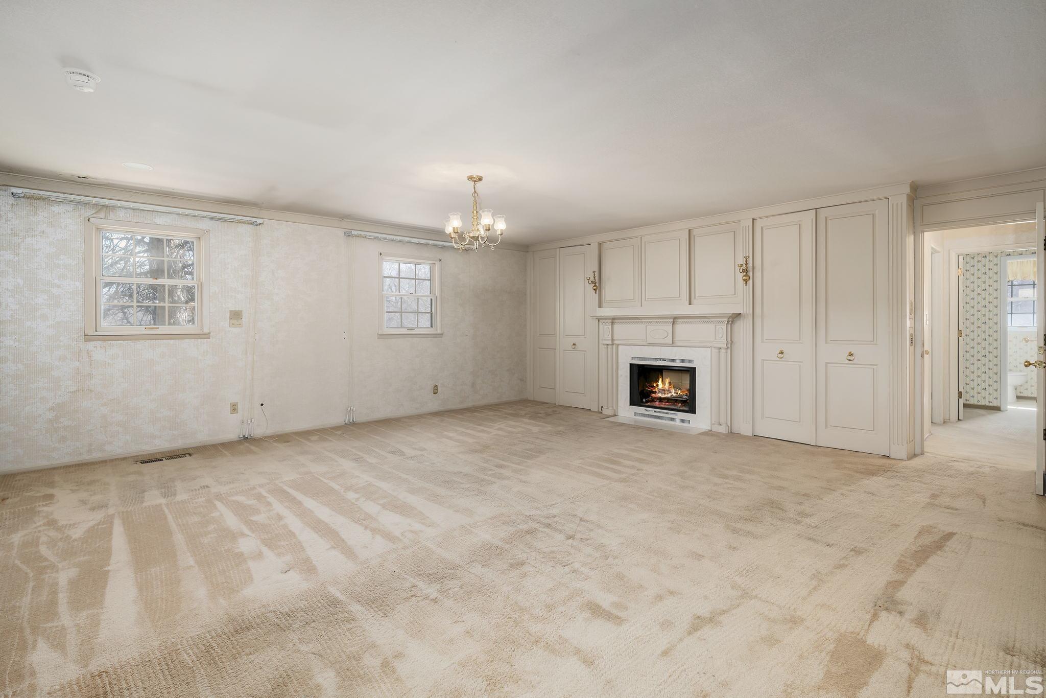 1545 Meadowview Lane Reno, NV 89509 - Photo 14 of 36 an empty room with fireplace