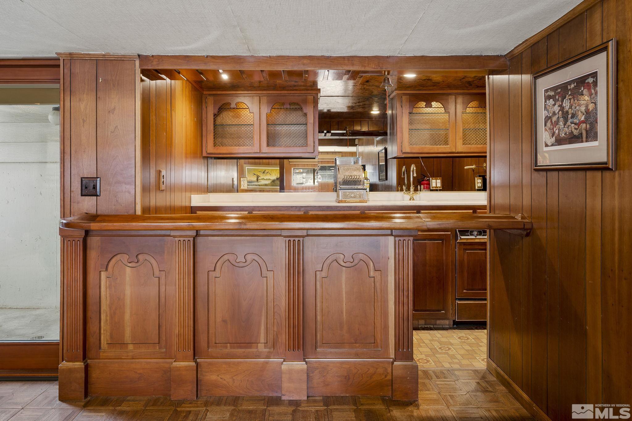 1545 Meadowview Lane Reno, NV 89509 - Photo 24 of 36 a kitchen with cabinets and chairs