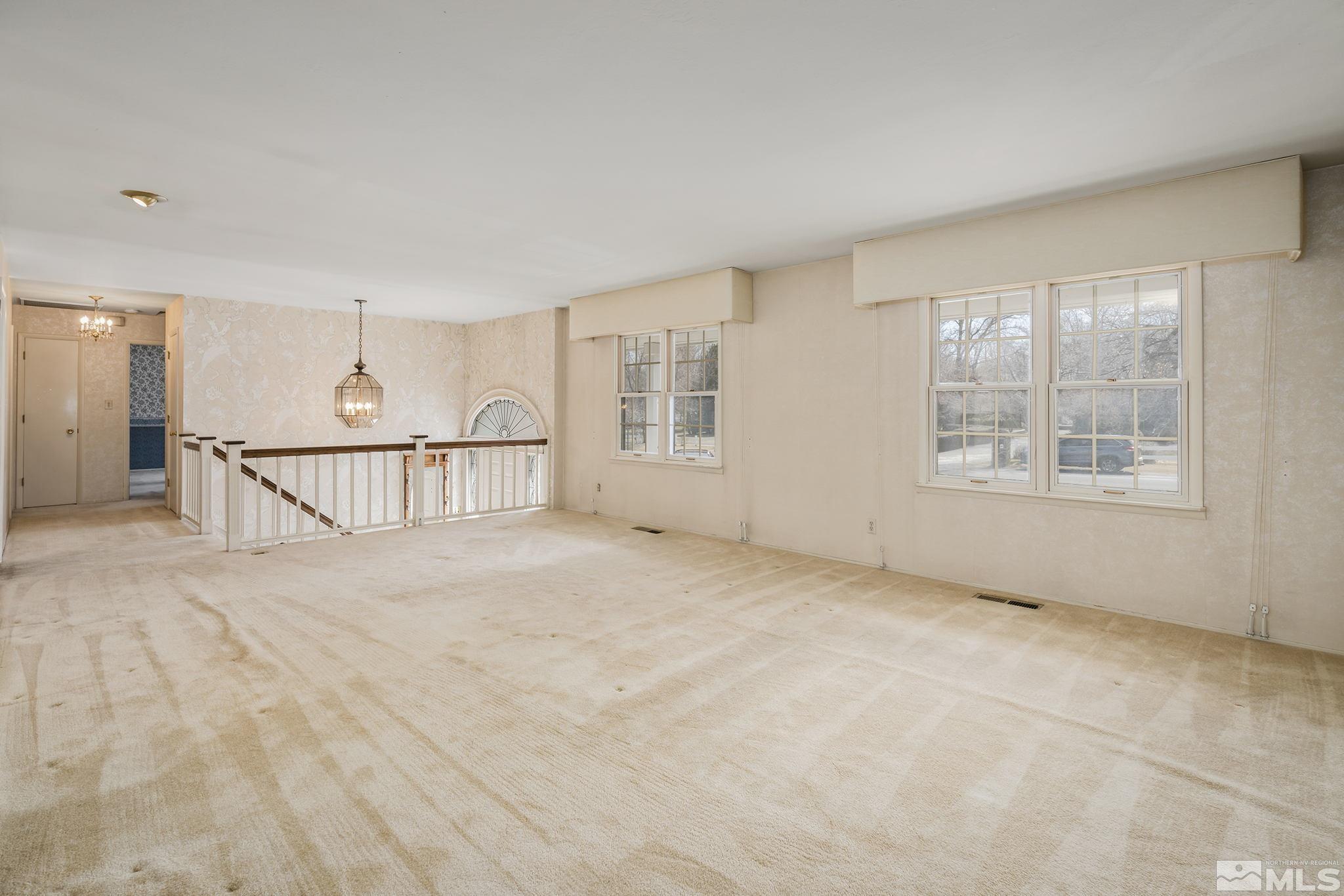 1545 Meadowview Lane Reno, NV 89509 - Photo 6 of 36 a view of an empty room with a window