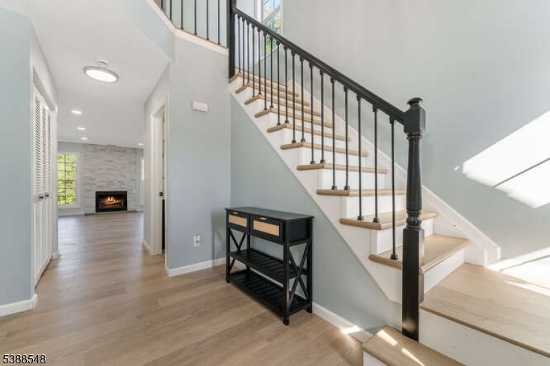 901 Fox Hill Place Milford, NJ 08848 - Photo 1 of 35 a view of entryway and hall with wooden floor