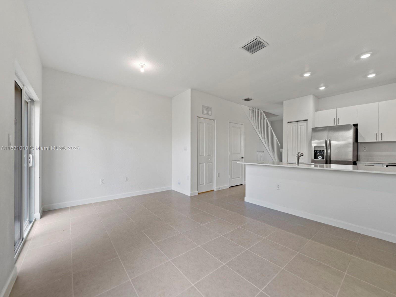 1505 Southeast 27th Street Homestead, FL 33035 - Photo 2 of 8 a view of kitchen with stainless steel appliances refrigerator oven