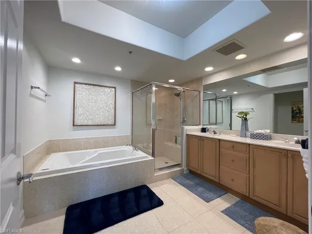 a bathroom with a bathtub and a sink