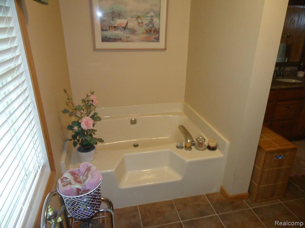 7600 Indian Trail Road Lexington, MI 48450 - Photo 10 of 15 Mater Tub.jpg