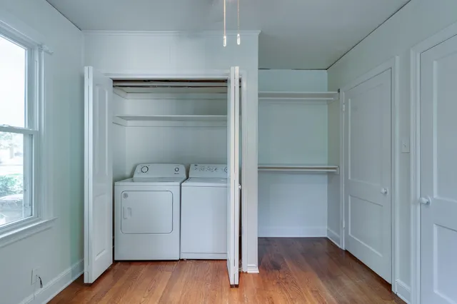 a view of storage and utility room with a washer and dryer
