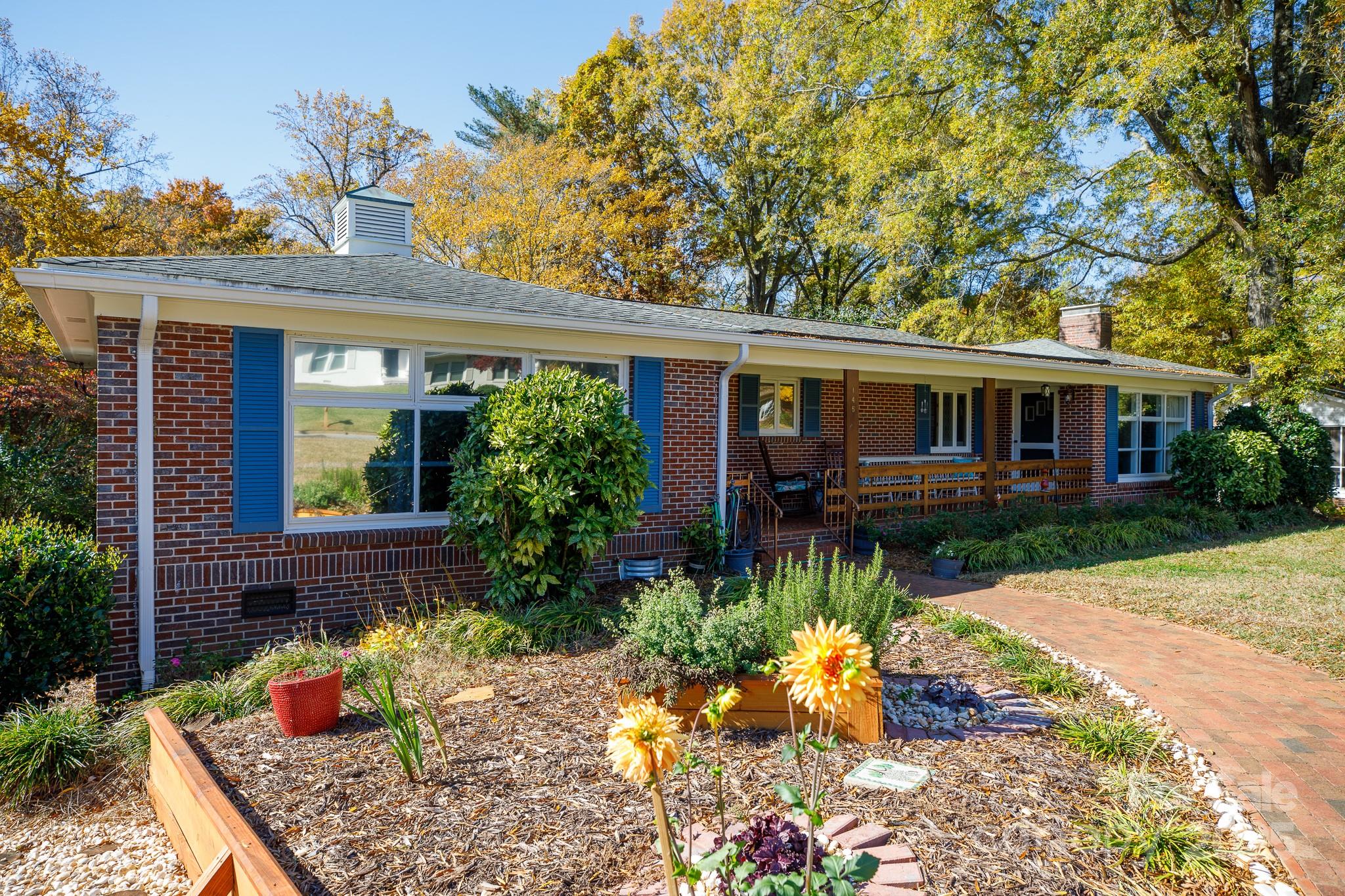 front view of house with a yard