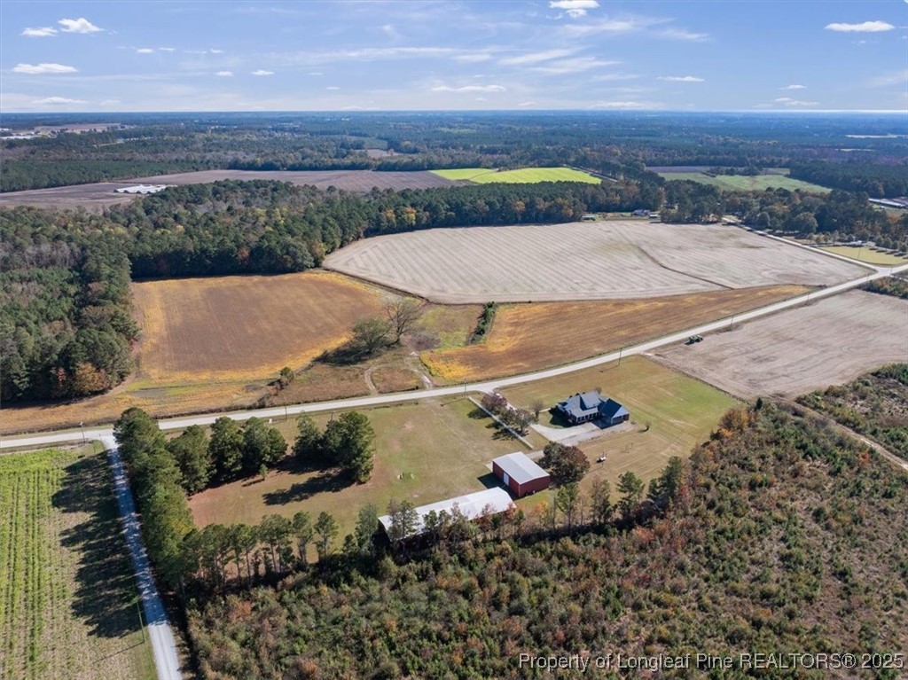 1594 Carroll Store Road Autryville, NC 28318 - Photo 5 of 36 an aerial view of a house with a yard
